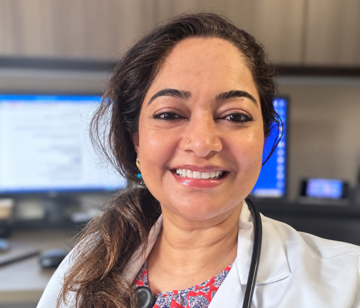 Smiling Doctor in a Cozy Clinic Office